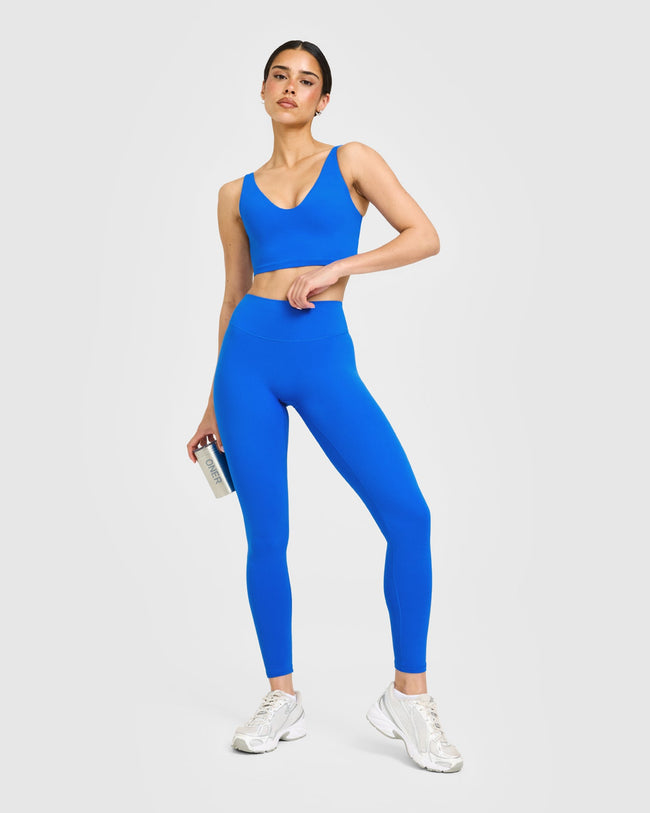 SoftMotion™ High Waisted Leggings with White Logo | Light Cobalt Blue