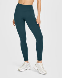 SoftMotion™ High Waisted Leggings with White Logo | Oil Blue