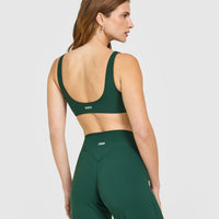 SoftMotion™ Scoop Back Bralette with White Logo | Dark Racing Green