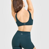 SoftMotion™ Scoop Back Bralette with White Logo | Oil Blue