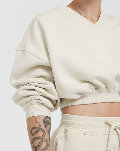 Cropped v neck sweatshirt on sale