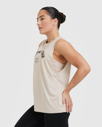 Raising The Bar Graphic Unisex Muscle Vest | Sand