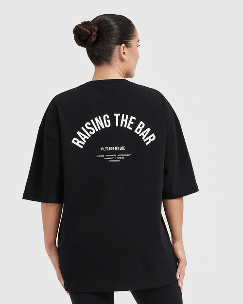 On those colder days when you need added comfort, reach for the BLACK  Raising The Bar Graphic Unisex Oversized Hoodie with Oner branding in the  front centre
